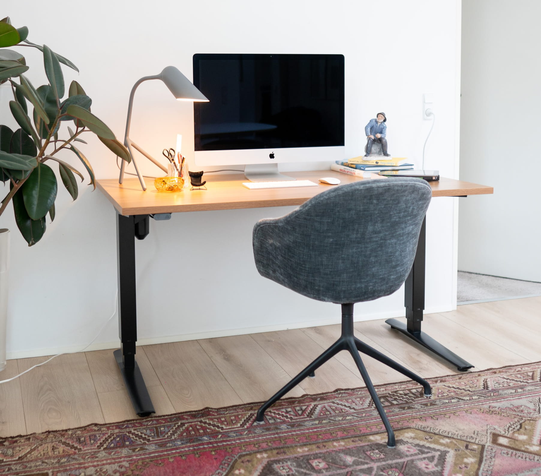 ConSet height adjustable desk in a home setting